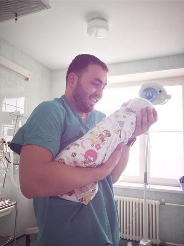 Александр Гобозов с малышом